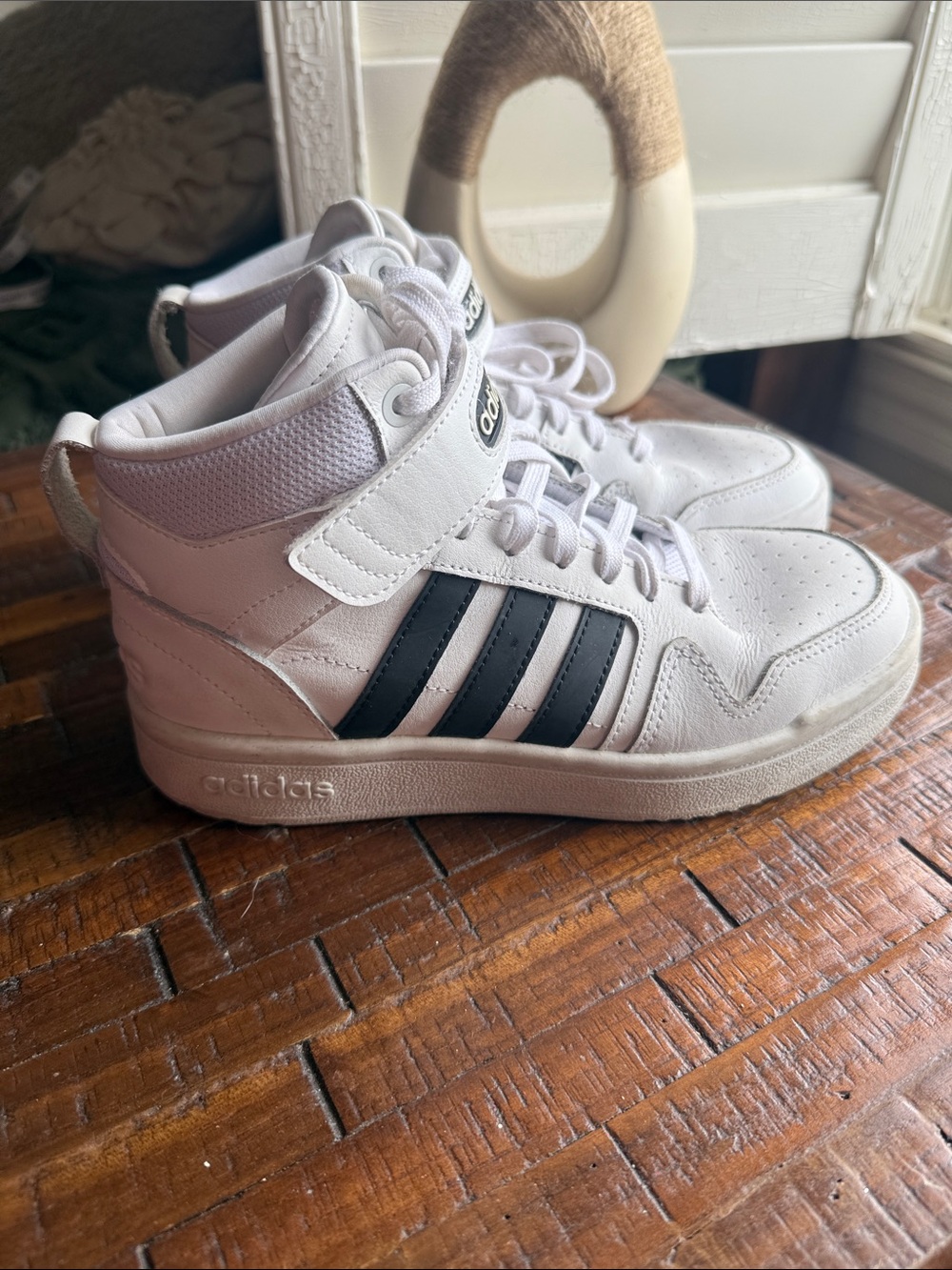 adidas women’s White High-Top Sneakers with Black Stripes